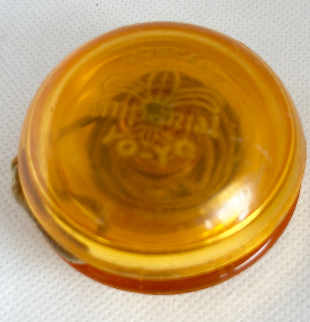 Vintage Duncan Fluer-de-lis Imperial Yo-Yo -Faded Orange- 70s Fair Condition - Seal is very faded.